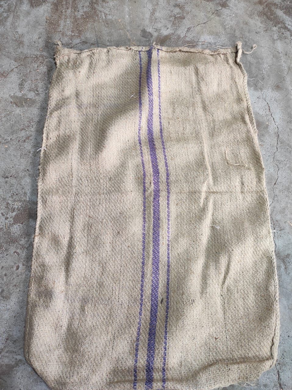 Purple-striped jute bags